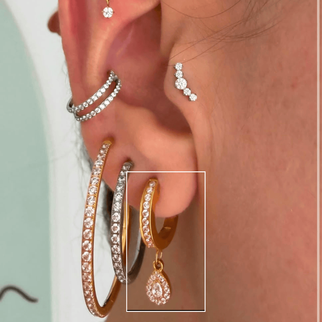 Argola Lumi Gold em Titânio com Pingente Gota | Pratinhas