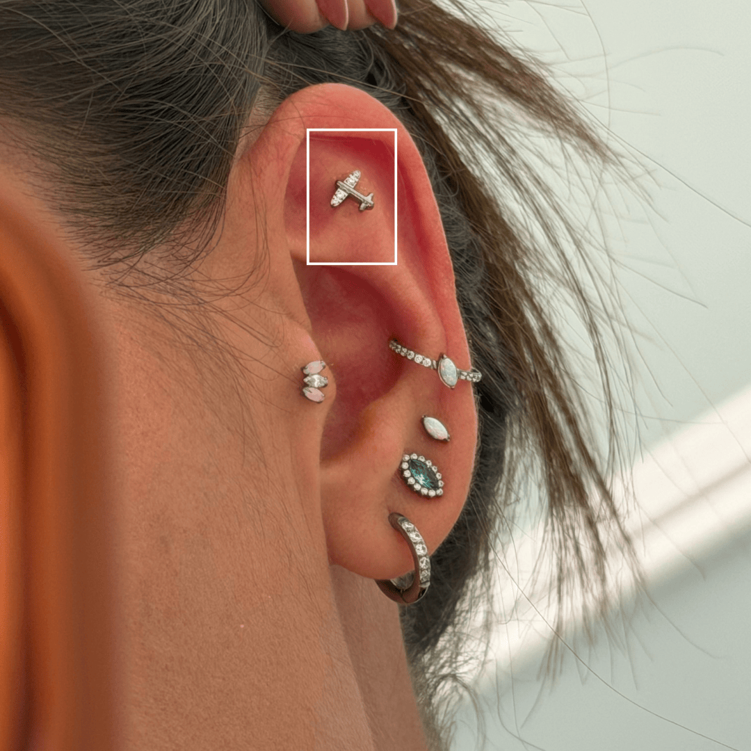 Piercing Avião em Titânio | Pratinhas